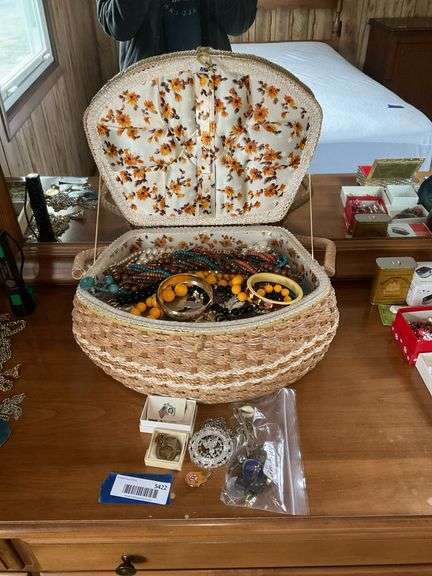 Costume jewelry lot in vintage sewing basket