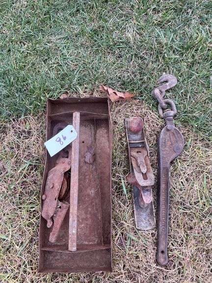 Old metal tool tray, wood, plain, and part of chain binder