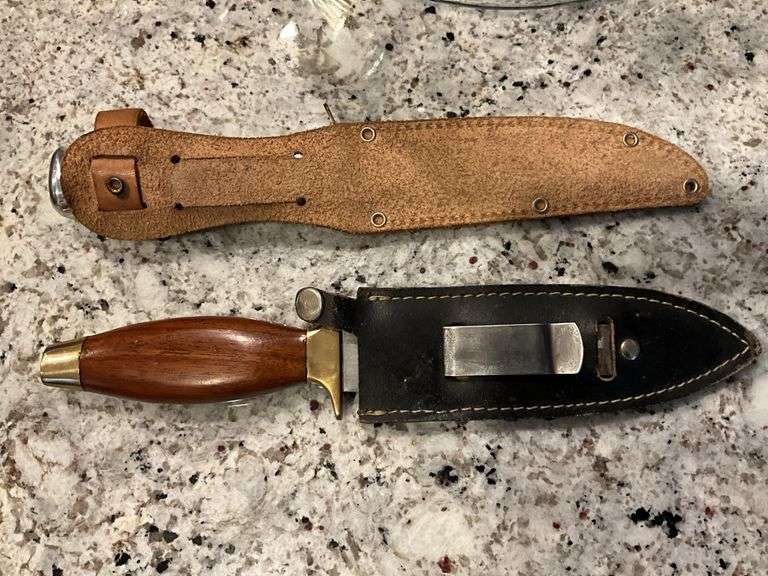 Two hunting knives w/ leather cases