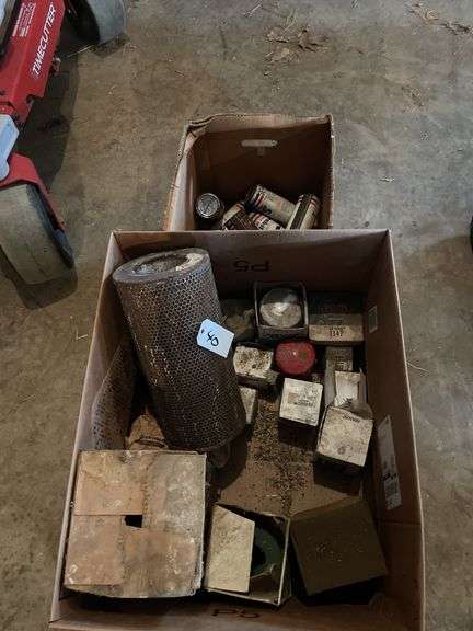 3 boxes of misc oil filters (John Deere, Deutz Allis, Napa and others) snowmobile oil, bucket of John Deere parts