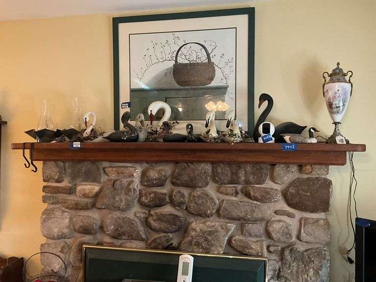 Swan and duck decoy group, two tin candle lamps, metal hooks