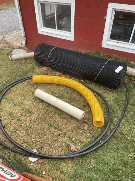 Roll of 1 inch plastic coated chicken wire 150 feet long,
Three-quarter inch black plastic pipe, and other hoses
