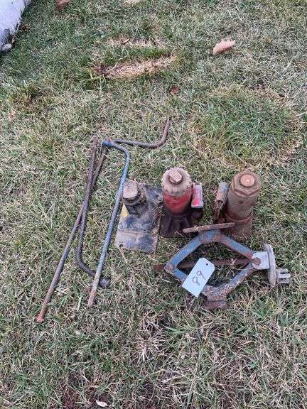 Two bottle jacks and two hand crank jacks