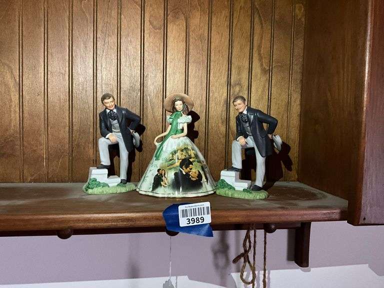 Bradford Gone with the Wind Scarlett porcelain figurine, and two Avon Rhett Butler figurines