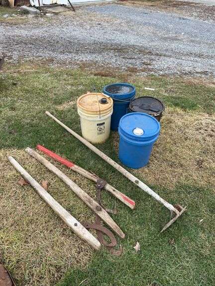 Three canthooks, cement hoe, and 45 gallon buckets