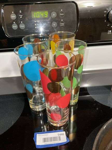 Five polka dot decorated tumblers