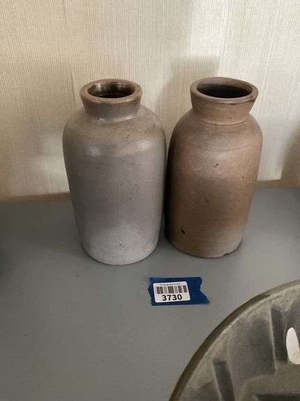 Two stoneware canning jars