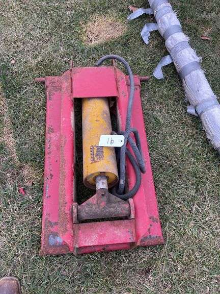 Two Midwest bolster hoists, One is badly damaged.