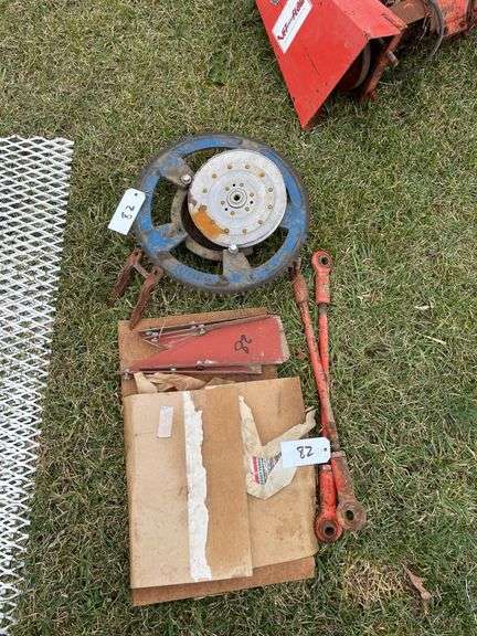 Miscellaneous parts and pieces, two tie rods, pulleys, etc.