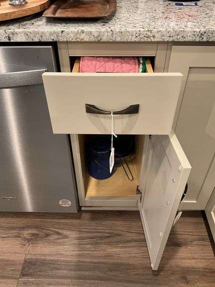 Contents of one kitchen drawer & one cupboard