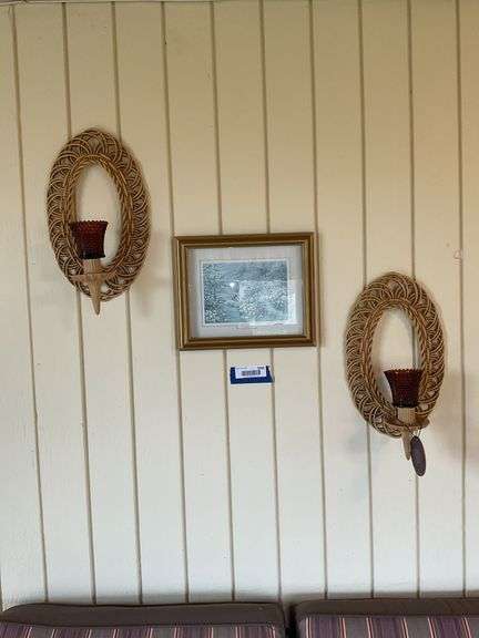 Wall hangings: wicker look candle sconces, framed print