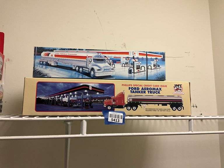 Two tanker truck models in boxes: Citgo, Phillips 66