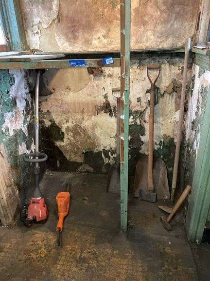 String trimmer, hedge trimmer, axe, sledge hammer, shovels, hoe