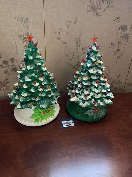 Two lighted ceramic Christmas trees