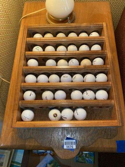 Golf ball collection and wall mount display rack