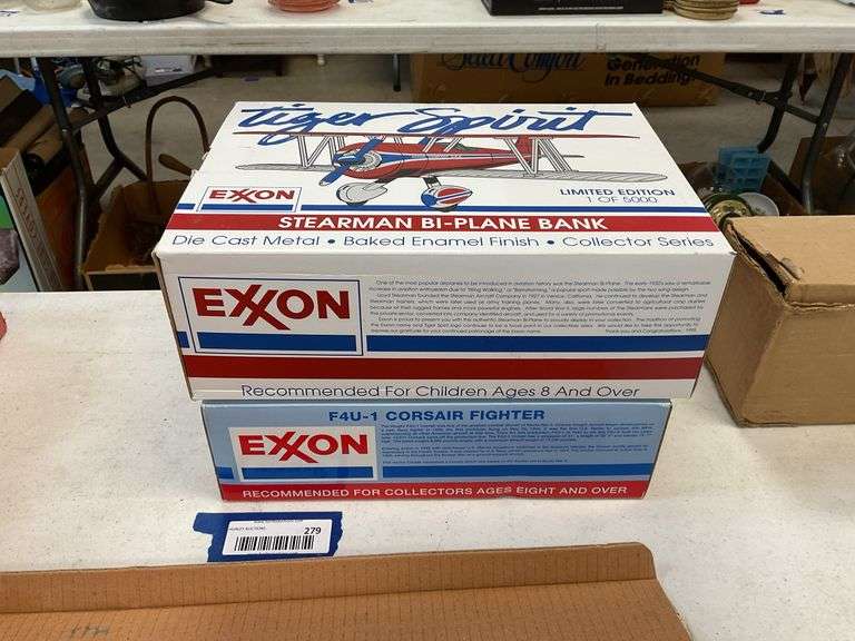 Two Exxon model airplanes in boxes: Tiger Spirit Spearman Bi-plane bank, and F4U-1 Corsair plane bank