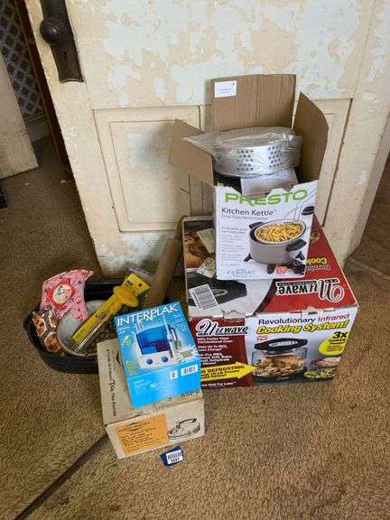 Teakettle, deep fryer, and NuWave cooker in boxes, dental waterjet, graniteware roaster, rolling pin, misc