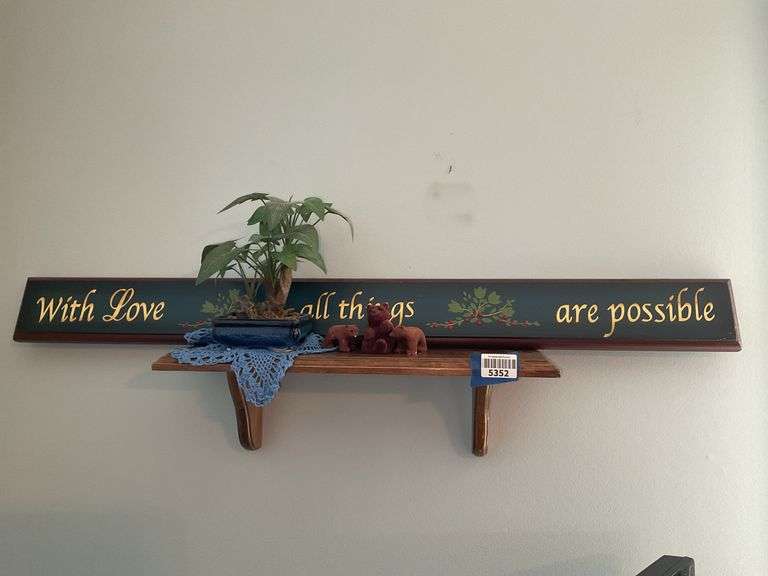Bracket wall shelf and contents: plaque, plant, doily, bear figurines