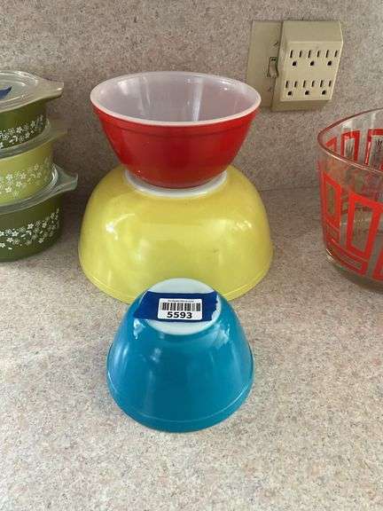 Three vintage Pyrex multi-color mixing bowls