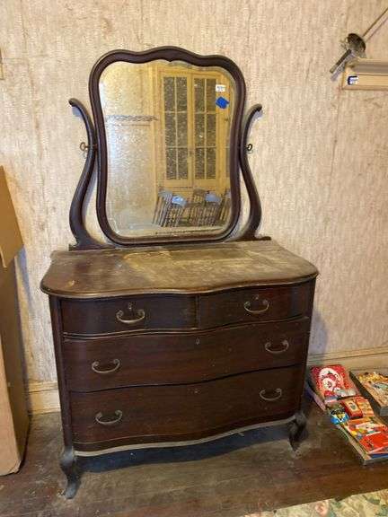 Turn-of-the-century dresser w/ shaped and beveled tilt mirror, cabriole legs, note damage to foot