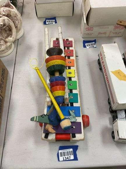 Wooden acrobat toy, Fisher-Price xylophone Pull-a-Tune, stacking rings ...