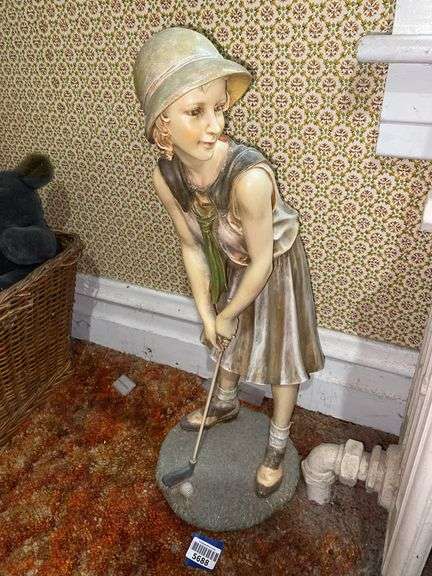 Large lady golfer figure