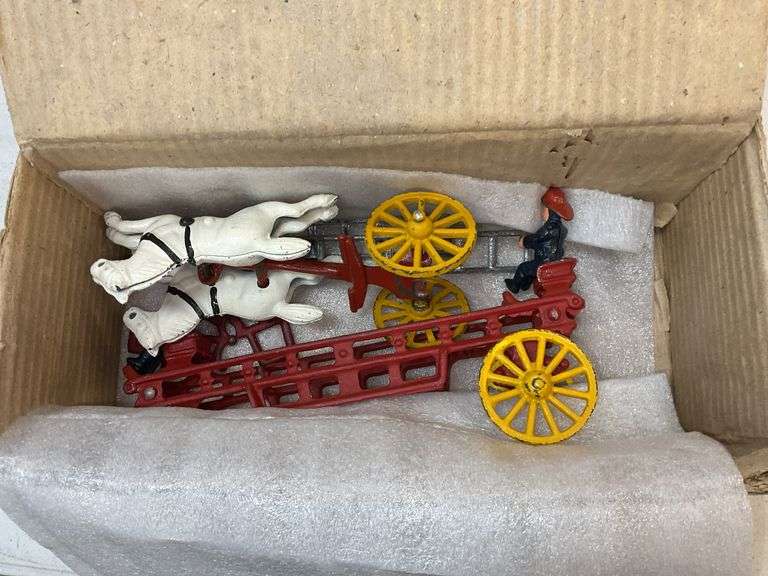 Cast iron horse drawn fire ladder wagon in box