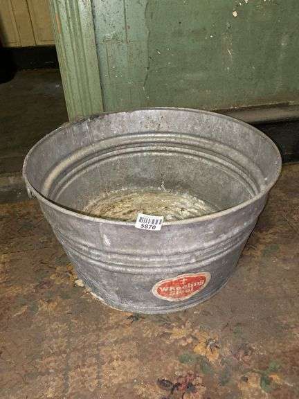 Wheeling galvanized tub w/ label
