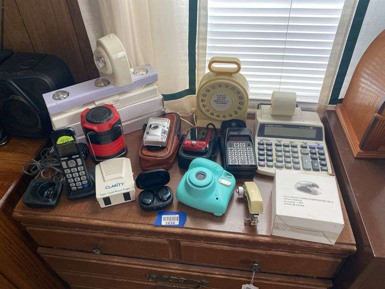 Kodak cameras, Clarity phone ringer, telephone cord reel, calculator & more