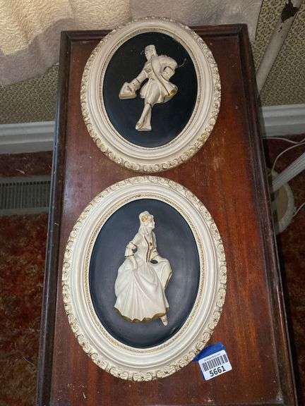 Pair oval chalkware Colonial couple wall plaques