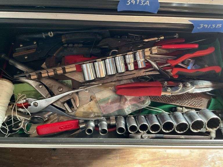 Contents of drawer to include sockets, snips, pliers and more