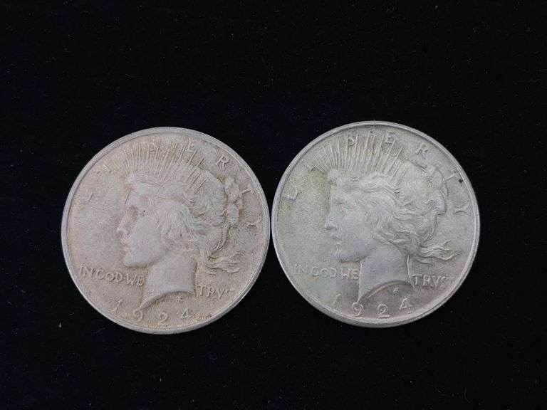 Two 1924 Peace silver dollar coins - by the pc take two