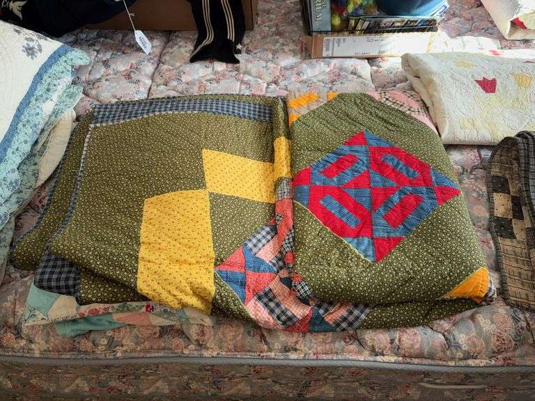 Patchwork quilt w/ green calico ground