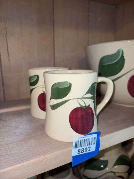Two WATT ware pottery apple pattern mugs