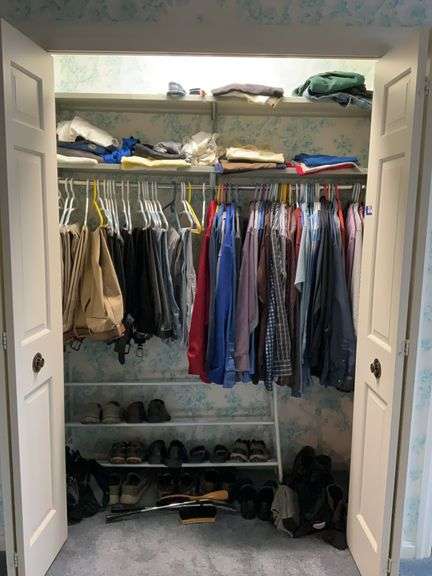 Contents of closet: men's clothing and shoes, shoe sz: between 8-9, clothes mainly size medium
