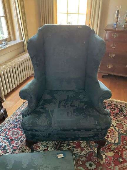 Wing chair in blue damask upholstery, cabriole legs
