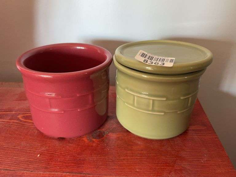 Two small Longaberger pottery jars, one has lid