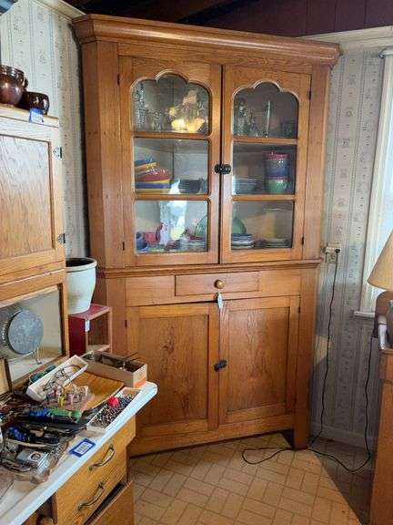 Corner cupboard w/ molded cornice, glazed top doors w/ triple arch top pane, over drawer and cupboard base - no contents 51x22x84 - MUST COME DURING LAST 2 HOURS OF PICKUP FOR THIS ITEM