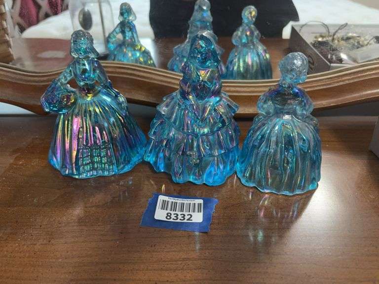 Three blue iridescent glass lady figurines