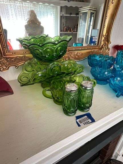 Green Moon & Star glassware including: salt/peppers, sugar/creamer, fruit bowl, pedestal dish