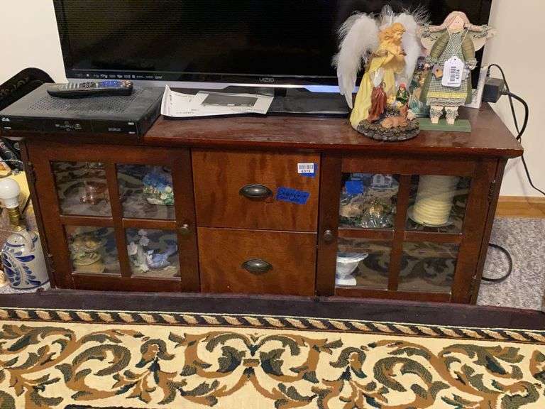 TV stand cabinet and interior contents: figurines, DVDs, CDs, personal CD players, misc - no top contents 48x21x20