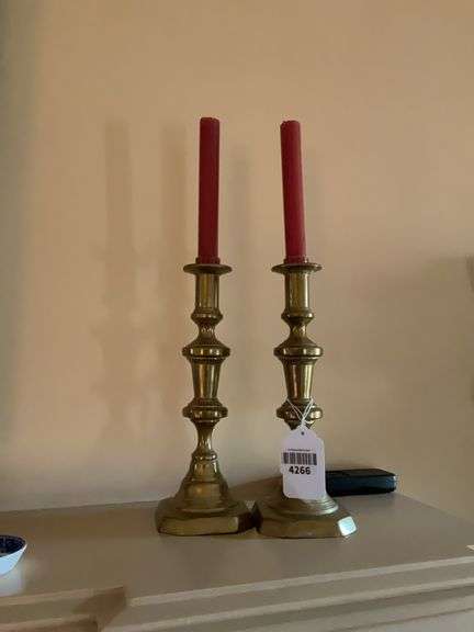 Pair of brass candlesticks, w/ candles