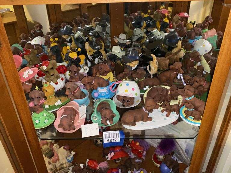 Contents of shelf: dog figurines including Hamilton Collection