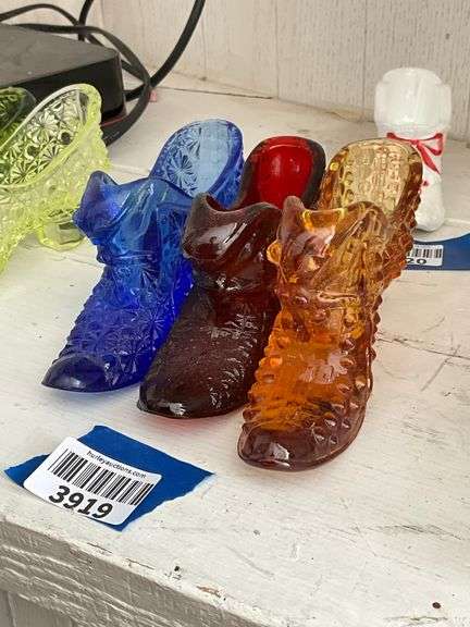 Three Fenton glass cat in shoes: blue, ruby, amber