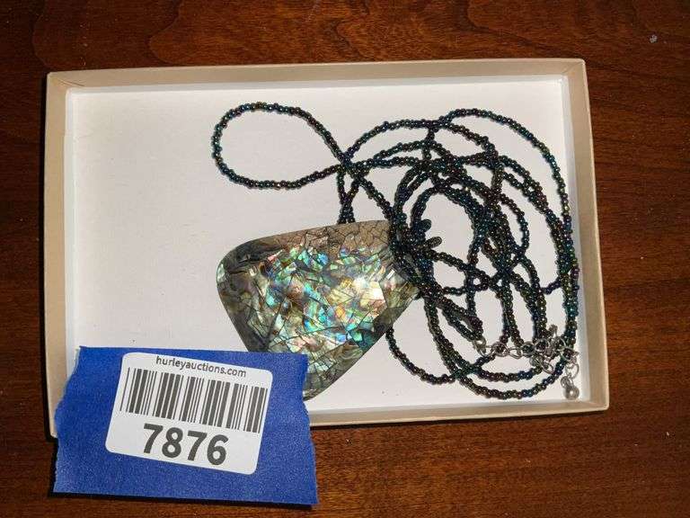 Costume jewelry beaded necklace w/ abalone pendant