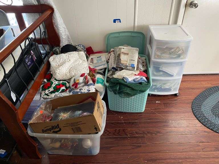 Large lot of linens, crochet work, garden flags, misc