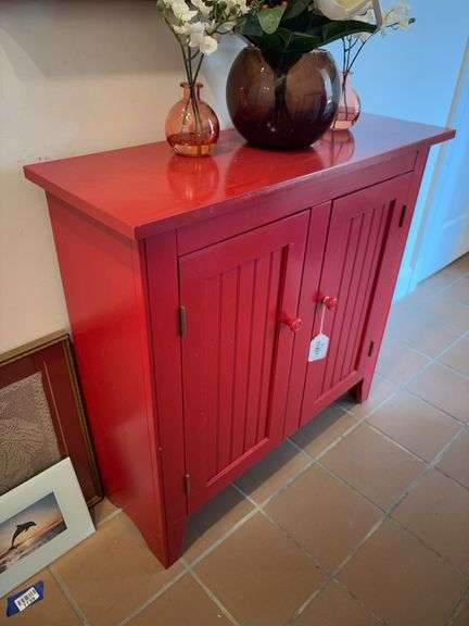 Red 2-door cabinet w/ beadboard door panels - no top contents 31x11x30