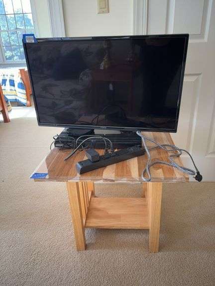 Wooden stand and electronics contents: Polaroid TV, Samsung DVD player, power strip24x24x22