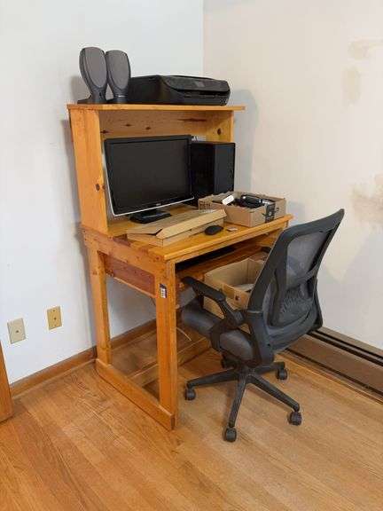 Knotty pine desk and swivel arm chair - no contents 34 x 24 x 54