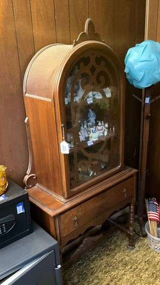1920s china cabinet w/ arched top cabinet over drawer w/ bookmatched veneer front, turned legs, carved stretcher - no contents - MUST COME DURING LAST 2 HOURS OF PICKUP FOR THIS ITEM